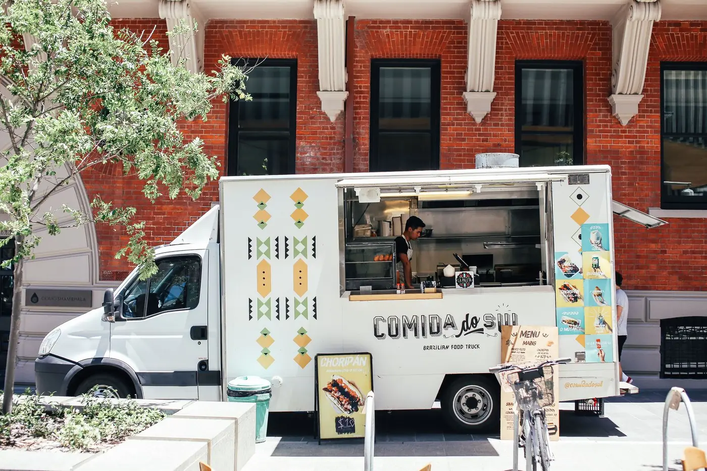 Illustrative stock photograph of a food truck operating on a city street
